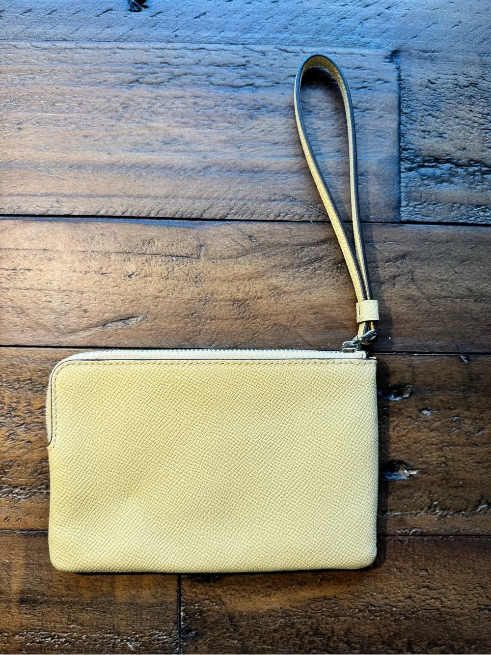 Coach Pale Yellow Pebbled Leather Wristlet